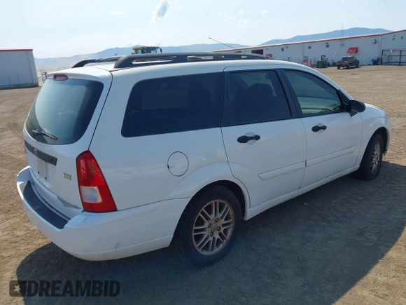 2003 Ford Focus SE Fleet z VIN 1FAFP36393W343129, wystawiony jako IAAI lot #42440063 z przebiegiem 184 413 mil mil oraz . Historia ofert i sprzedaży dostępna na DreamBid. Obrazek 4.