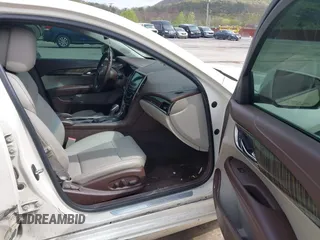 2014 Cadillac ATS Luxury RWD z VIN 1G6AB5RX6E0130600, wystawiony jako IAAI lot #42094510 z przebiegiem 122 872 mil mil oraz . Historia ofert i sprzedaży dostępna na DreamBid. Obrazek 5.