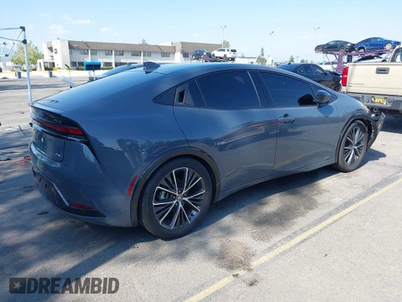 2023 Toyota Prius LE z VIN JTDADABU6P3001399, wystawiony jako IAAI lot #42137395 z przebiegiem 37 716 mil mil oraz . Historia ofert i sprzedaży dostępna na DreamBid. Obrazek 4.