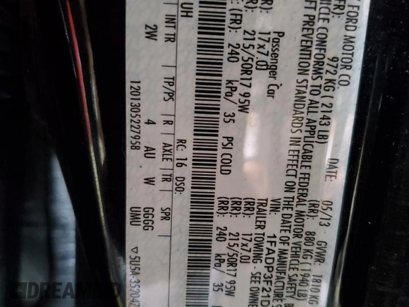 2013 Ford Focus SE with VIN 1FADP3F21DL348827, listed as a Copart auction lot 63589405 with 144,156 mi miles and Salvage title. Bid and sale history available at DreamBid. Image 12.
