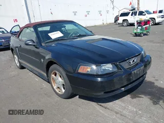 2002 Ford Mustang Deluxe z VIN 1FAFP44422F239792, wystawiony jako IAAI lot #42165191 z przebiegiem 165 098 mil mil oraz . Historia ofert i sprzedaży dostępna na DreamBid. Obrazek 1.