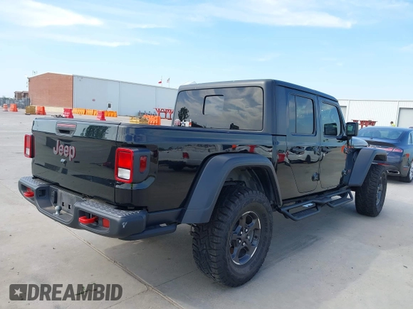 2021 Jeep Gladiator Rubicon z VIN 1C6JJTBG6ML535939, wystawiony jako IAAI lot #42260764 z przebiegiem 114 060 mil mil oraz . Historia ofert i sprzedaży dostępna na DreamBid. Obrazek 4.