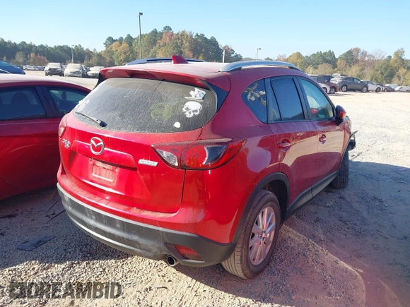 2015 Mazda CX-5 Touring with VIN JM3KE4CY6F0455468, listed as a IAAI auction lot 40669780 with 225,831 mi miles and . Bid and sale history available at carsss.com. Image 4.