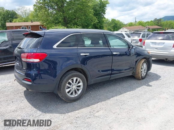 2017 Kia Sorento LX z VIN 5XYPG4A35HG214790, wystawiony jako IAAI lot #42202652 z przebiegiem 89 655 mil mil oraz . Historia ofert i sprzedaży dostępna na DreamBid. Obrazek 4.