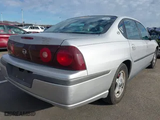 2003 Chevrolet Impala with VIN 2G1WF52E639136361, listed as a IAAI auction lot 41216021 with 135,055 mi miles. Bid and sale history available at carsss.com. Image 4.