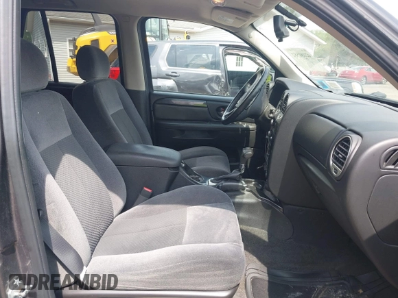 2008 GMC Envoy SLE2 with VIN 1GKDT13S982218308, listed as a IAAI auction lot 42180582 with 69,347 mi miles. Bid and sale history available at carsss.com. Image 5.