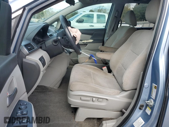 2013 Honda Odyssey EX z VIN 5FNRL5H40DB051489, wystawiony jako Copart lot #41862515 z przebiegiem 172 966 mil mil oraz Szkody całkowita. Historia ofert i sprzedaży dostępna na DreamBid. Obrazek 7.