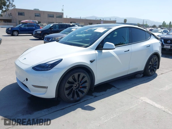 2022 Tesla Model Y Performance z VIN 7SAYGDEF2NF347456, wystawiony jako IAAI lot #42177725 z przebiegiem 29 374 mil mil oraz . Historia ofert i sprzedaży dostępna na DreamBid. Obrazek 2.