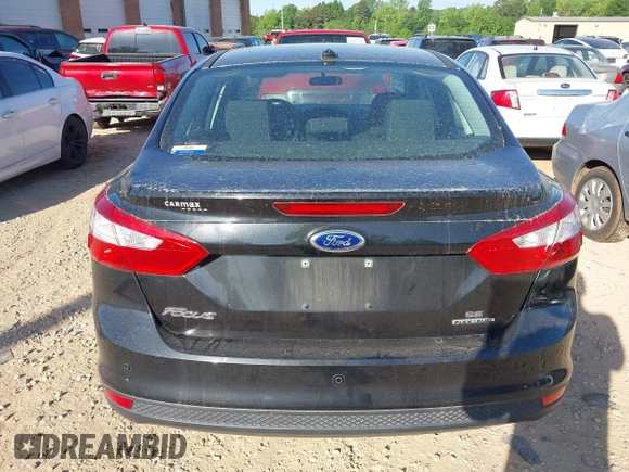 2013 Ford Focus SE z VIN 1FADP3F2XDL311811, wystawiony jako IAAI lot #42127000 z przebiegiem 136 683 mil mil oraz . Historia ofert i sprzedaży dostępna na DreamBid. Obrazek 16.