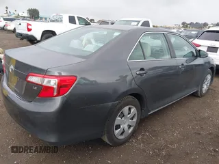 2014 Toyota Camry L with VIN 4T1BF1FK5EU403313, listed as a IAAI auction lot 42141338 with 185,925 mi miles and . Bid and sale history available at DreamBid. Image 4.
