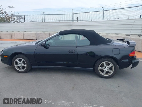 1999 Toyota Celica GT z VIN JT5FG02T9X0056800, wystawiony jako IAAI lot #42374921 z przebiegiem 48 157 mil mil oraz . Historia ofert i sprzedaży dostępna na DreamBid. Obrazek 14.