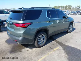 2022 Chevrolet Traverse LT Leather with VIN 1GNEVHKWXNJ141805, listed as a IAAI auction lot 41641352 with 71,504 mi miles. Bid and sale history available at carsss.com. Image 4.