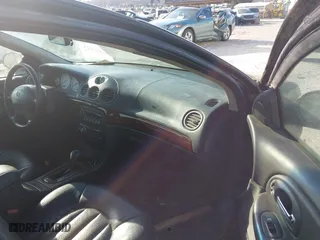 1999 Chrysler LHS with VIN 2C3HC56G5XH837185, listed as a IAAI auction lot 41865542 with 139,590 mi miles. Bid and sale history available at carsss.com. Image 5.