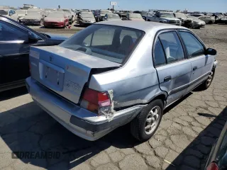 1995 Toyota Tercel DX z VIN JT2EL56E7S7011335, wystawiony jako Copart lot #67978774 z przebiegiem 182 025 mil mil oraz Szkoda całkowita • Salvage title. Historia ofert i sprzedaży dostępna na DreamBid. Obrazek 3.