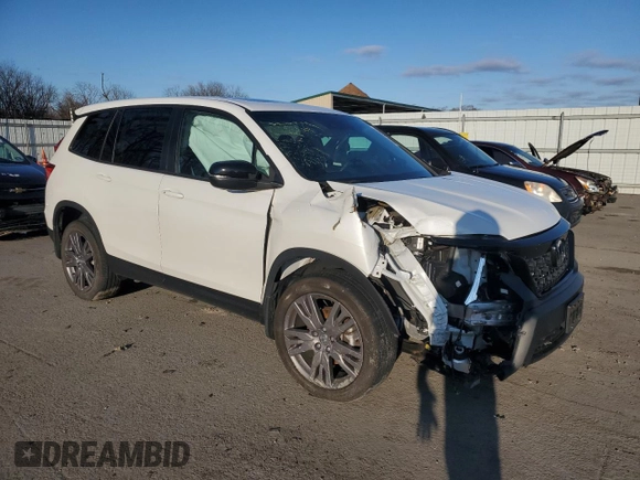 2019 Honda Passport EX-L z VIN 5FNYF8H57KB029404, wystawiony jako Copart lot #86810504 z przebiegiem Nie podano mil oraz Szkoda całkowita • Salvage title. Historia ofert i sprzedaży dostępna na DreamBid. Obrazek 4.