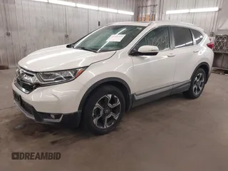 2017 Honda CR-V Touring with VIN 2HKRW2H94HH685350, listed as a IAAI auction lot 41753725 with 75,749 mi miles. Bid and sale history available at carsss.com. Image 2.