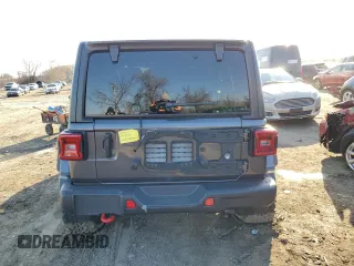 2021 Jeep Wrangler Unlimited Rubicon with VIN 1C4JJXFG8MW869995, listed as a Copart auction lot 83472254 with 48,302 mi miles and Salvage Title. Bid and sale history available at carsss.com. Image 6.