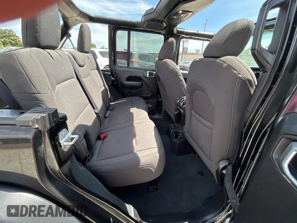 2023 Jeep Wrangler Sport S with VIN 1C4HJXDG2PW615754, listed as a Copart auction lot 53884255 with 34,427 mi miles and Clean Title. Bid and sale history available at DreamBid. Image 6.