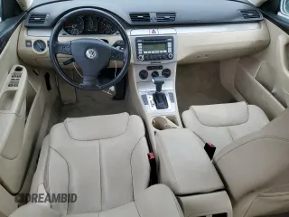 2009 Volkswagen Passat z VIN WVWJK93C49P054575, wystawiony jako Copart lot #57880855 z przebiegiem 148 327 mil mil oraz Szkody całkowita. Historia ofert i sprzedaży dostępna na DreamBid. Obrazek 8.