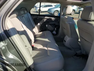 2006 Cadillac DTS 1SC z VIN 1G6KD57Y76U237062, wystawiony jako Copart lot #70920534 z przebiegiem 84 589 mil mil oraz Szkoda całkowita • Salvage title. Historia ofert i sprzedaży dostępna na DreamBid. Obrazek 11.