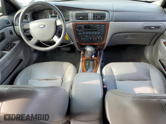 2007 Ford Taurus SEL with VIN 1FAFP56U57A126684, listed as a Copart auction lot 57342035 with 158,293 mi miles and Salvage title. Bid and sale history available at DreamBid. Image 8.