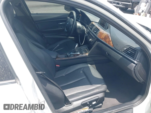 2014 BMW 3 Series 328i with VIN WBA3C1C52EK110753, listed as a IAAI auction lot 42444129 with 169,035 mi miles and . Bid and sale history available at DreamBid. Image 5.