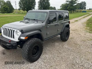 2019 Jeep Wrangler Unlimited Sport S with VIN 1C4HJXDG9KW569235, listed as a Copart auction lot 60338215 with 47,107 mi miles and Clean title. Bid and sale history available at DreamBid. Image 2.