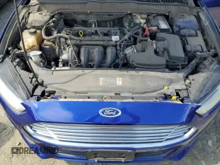 2015 Ford Fusion SE z VIN 3FA6P0H77FR188697, wystawiony jako Copart lot #57661995 z przebiegiem 238 713 mil mil oraz Czysty tytuł • Clean title. Historia ofert i sprzedaży dostępna na DreamBid. Obrazek 11.