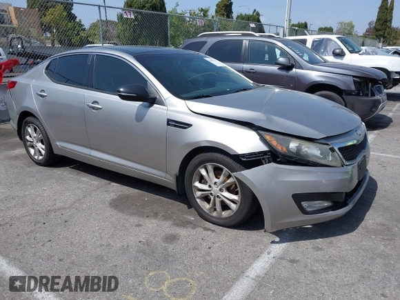 2013 Kia Optima EX z VIN 5XXGN4A70DG148060, wystawiony jako IAAI lot #41900134 z przebiegiem 149 214 mil mil oraz . Historia ofert i sprzedaży dostępna na DreamBid. Obrazek 1.