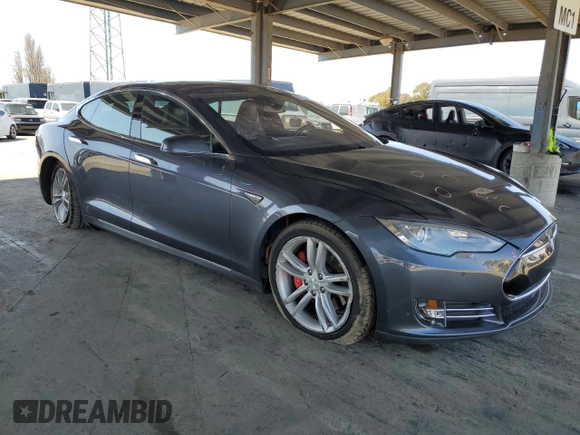 2014 Tesla Model S 60 with VIN 5YJSA1H17EFP63229, listed as a Copart auction lot 51776195 with 156,356 mi miles and Salvage Title. Bid and sale history available at DreamBid. Image 4.