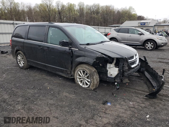 2019 Dodge Grand Caravan SXT with VIN 2C4RDGCG4KR580424, listed as a Copart auction lot 52715245 with 130,696 mi miles and Salvage Title. Bid and sale history available at DreamBid. Image 4.