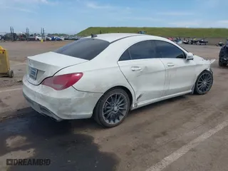 2014 Mercedes-Benz CLA-Class CLA 250 with VIN WDDSJ4GB0EN136231, listed as a IAAI auction lot 42046182 with 94,729 mi miles. Bid and sale history available at carsss.com. Image 4.