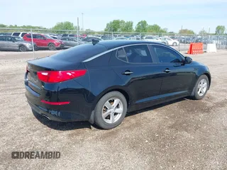 2014 Kia Optima LX with VIN 5XXGM4A76EG346193, listed as a IAAI auction lot 42176760 with 124,702 mi miles and . Bid and sale history available at DreamBid. Image 4.