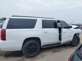 2016 Chevrolet Suburban LT with VIN 1GNSKHKC9GR263027, listed as a IAAI auction lot 42463711 with Not provided miles and . Bid and sale history available at DreamBid. Image 13.
