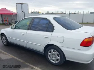 1999 Honda Civic EX with VIN 2HGEJ8648XH526377, listed as a IAAI auction lot 41517330 with 167,375 mi miles. Bid and sale history available at carsss.com. Image 14.