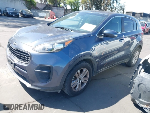 2019 Kia Sportage LX with VIN KNDPM3ACXK7513831, listed as a IAAI auction lot 41969252 with 99,388 mi miles. Bid and sale history available at carsss.com. Image 2.