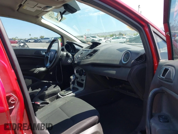 2015 Ford Fiesta SE with VIN 3FADP4BJ4FM149307, listed as a IAAI auction lot 42078091 with 124,529 mi miles. Bid and sale history available at carsss.com. Image 5.