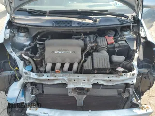 2007 Honda Fit z VIN JHMGD38487S045082, wystawiony jako Copart lot #59336665 z przebiegiem 73 754 mil mil oraz Szkoda całkowita • Salvage title. Historia ofert i sprzedaży dostępna na DreamBid. Obrazek 11.