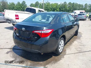 2016 Toyota Corolla L with VIN 2T1BURHE2GC607471, listed as a IAAI auction lot 42623564 with 102,537 mi miles and . Bid and sale history available at DreamBid. Image 4.