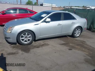 2009 Cadillac CTS RWD z VIN 1G6DU57VX90143820, wystawiony jako IAAI lot #42450086 z przebiegiem 170 656 mil mil oraz . Historia ofert i sprzedaży dostępna na DreamBid. Obrazek 12.