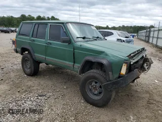 1996 Jeep Cherokee SE with VIN 1J4FT28S5TL244548, listed as a Copart auction lot 68908934 with 182,507 mi miles and Salvage Title. Bid and sale history available at carsss.com. Image 4.