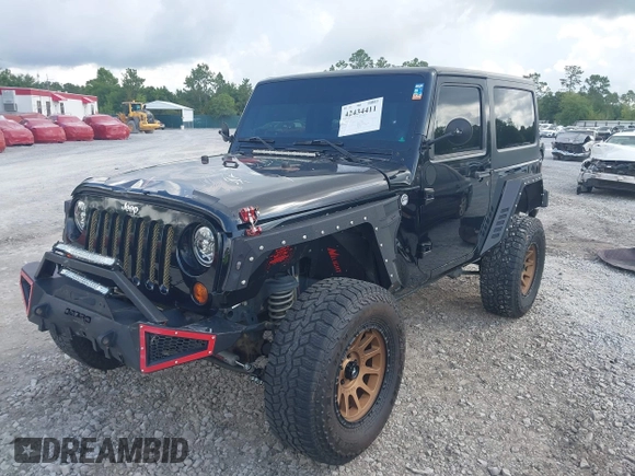 2012 Jeep Wrangler Sport z VIN 1C4AJWAG2CL286680, wystawiony jako IAAI lot #42434411 z przebiegiem 97 142 mil mil oraz . Historia ofert i sprzedaży dostępna na DreamBid. Obrazek 2.