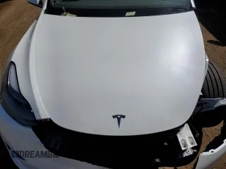 2024 Tesla Model Y Performance with VIN 7SAYGDEF6RA284171, listed as a Copart auction lot 50317205 with 6,870 mi miles and Salvage Title. Bid and sale history available at DreamBid. Image 12.
