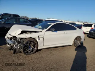 2018 BMW M4 with VIN WBS4Y9C57JAA92477, listed as a Copart auction lot 85118604 with 85,428 mi miles and Salvage Title. Bid and sale history available at carsss.com. Image 1.