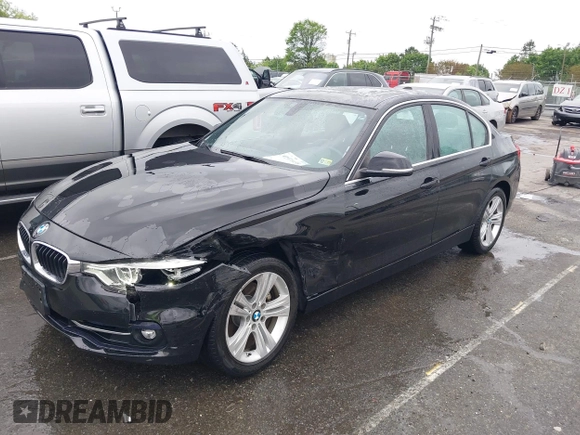 2018 BMW 3 Series 330i xDrive with VIN WBA8D9G50JNU69376, listed as a IAAI auction lot 41971138 with 61,551 mi miles. Bid and sale history available at carsss.com. Image 17.