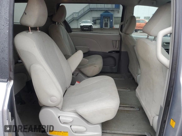 2012 Toyota Sienna with VIN 5TDZK3DC1CS213175, listed as a Copart auction lot 55475615 with 216,082 mi miles and Salvage title. Bid and sale history available at DreamBid. Image 11.