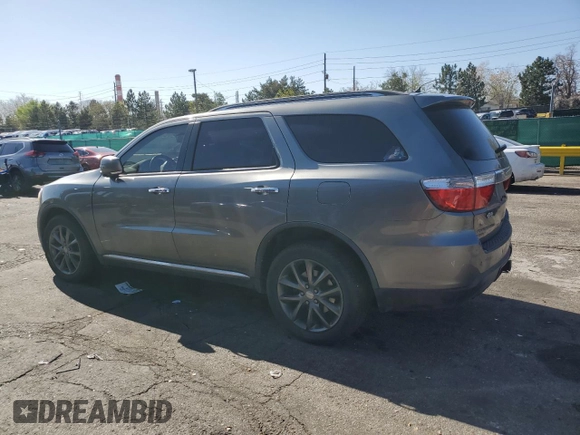 2013 Dodge Durango Crew with VIN 1C4RDJDG7DC554102, listed as a Copart auction lot 54045335 with 228,176 mi miles and Salvage Title. Bid and sale history available at DreamBid. Image 2.