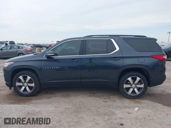 2021 Chevrolet Traverse LT with VIN 1GNERHKW4MJ191814, listed as a IAAI auction lot 42185544 with 87,493 mi miles and . Bid and sale history available at DreamBid. Image 14.