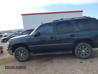 2006 Chevrolet Tahoe LS with VIN 1GNEC13V16J163907, listed as a IAAI auction lot 41232903 with 142,382 mi miles. Bid and sale history available at carsss.com. Image 14.