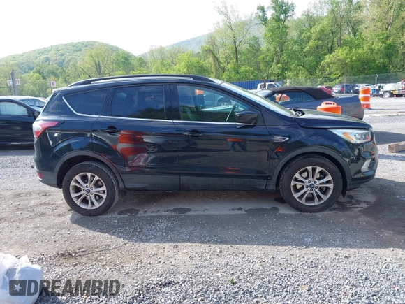 2017 Ford Escape SE with VIN 1FMCU9G91HUB56073, listed as a IAAI auction lot 42130463 with 94,275 mi miles and . Bid and sale history available at carsss.com. Image 13.